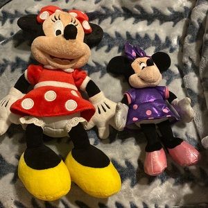 Two Minnie Mouse plushies.